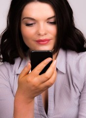 Woman Holding Cell Phone